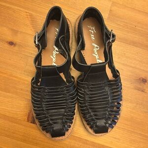 Free People black leather sandals